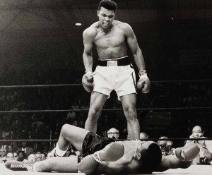 muhammad-ali-stands-over-sonny-liston-in-1964
